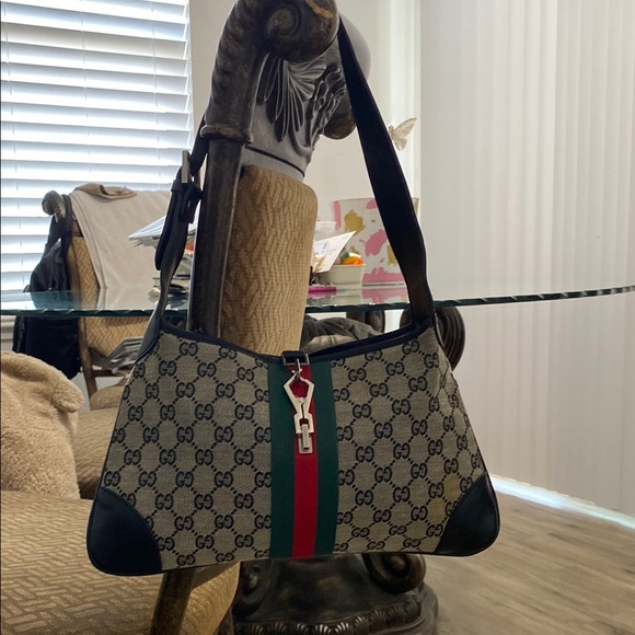 Brown and Black Shoulder Bag with Iconic Design - Picture 7 of 12